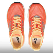 New Balance FuelCell Rebel v5 Hombre Tangerine Heat Silver Metallic