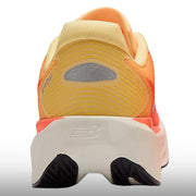 New Balance FuelCell Rebel v5 Hombre Tangerine Heat Silver Metallic