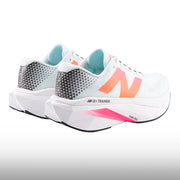 New Balance FuelCell SuperComp Trainer v3 Hombre Pink Heat Glint Blue